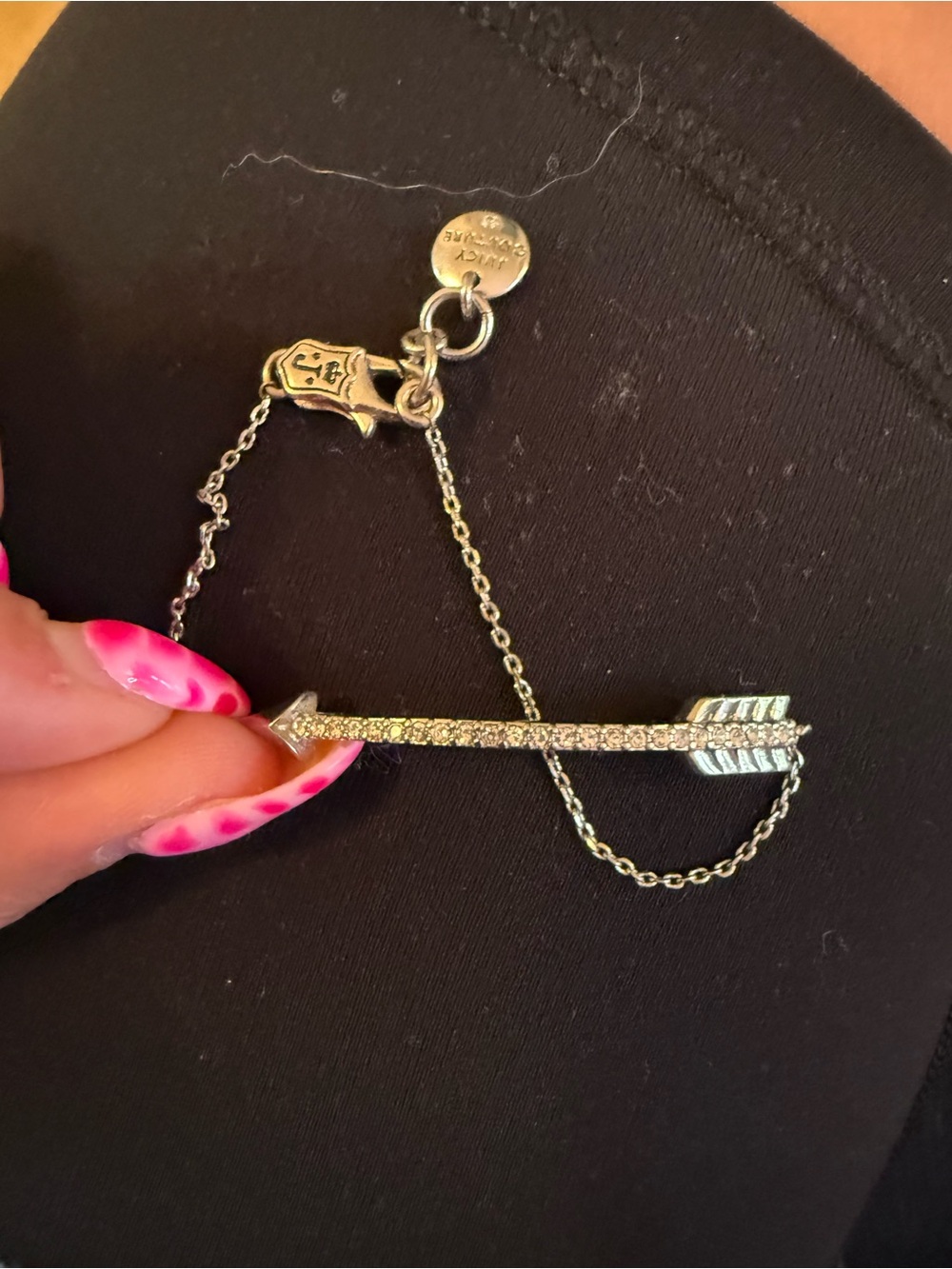 Juicy Couture silver tone arrow bracelet with crystal accents